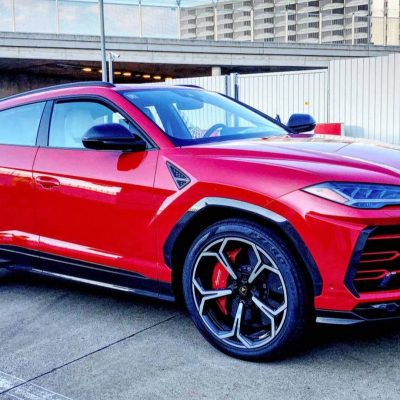 Lamborghini-urus-hire-in-red.jpeg